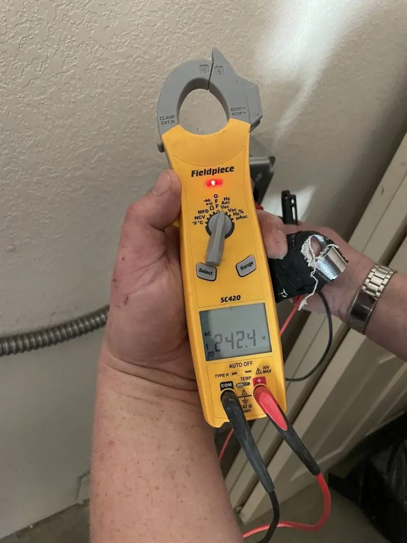 Voltage testing with clamp meter during Generator Installation in Norfolk